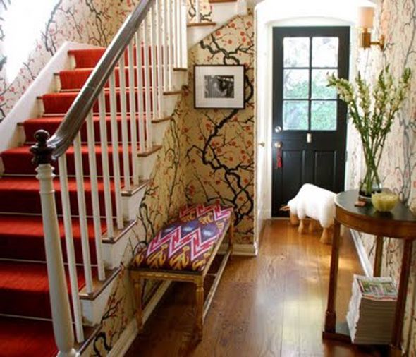  photo Green-Bicycle-Design-wallpapered-foyer-cherry-branches-ikat-bench-red-stairs.jpg