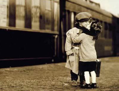 Little Boy And Girl Holding Hands In Black And White. little kids kissing